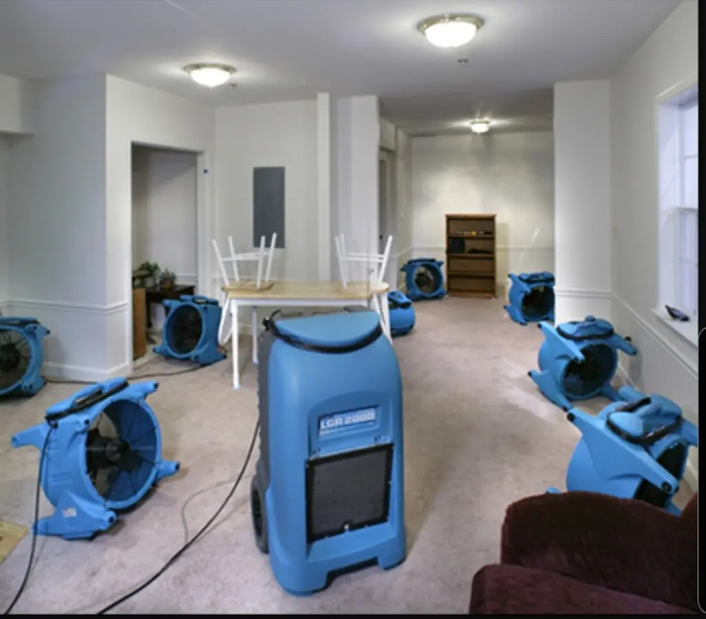 Air movers and dehumidifier setup for Water Damage Restoration in Kinross
